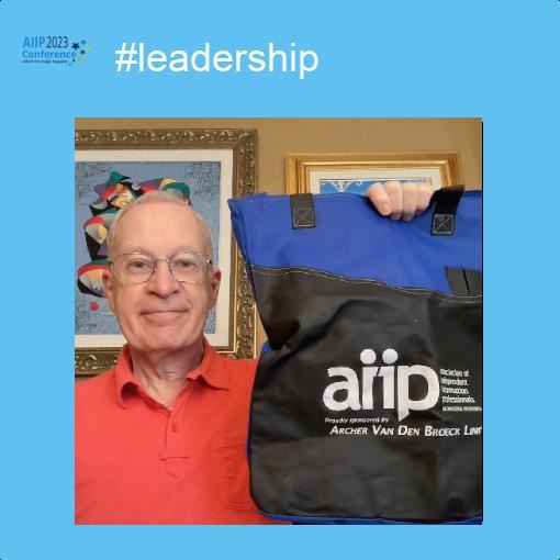 Richard Hulser displays AIIP conference swag